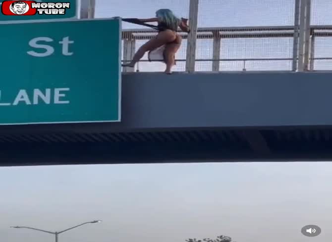 Video :She twerks beside a road sign while wearing a thong